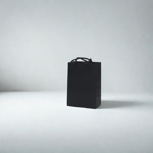 Black paper gift and shopping bag with handles for retail and gifting