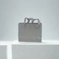 Small gray matte paper gift bag with grosgrain ribbon handles